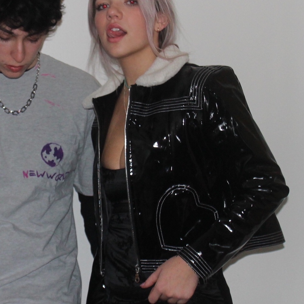 Dolls kill Vegan patent leather black jacket.